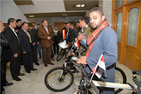 فاعليات تسليم الدراجات الهوائية إلى أبناء وأسر الشهداء والمصابين بمحافظة أسيوط