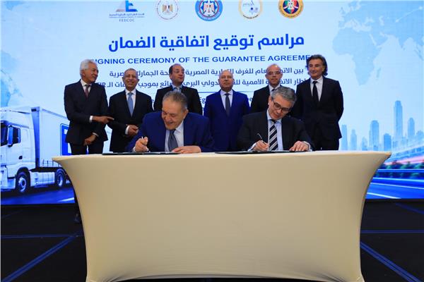 أثناء توقيع اتفاقية الضامن