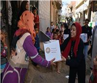 طلاب من أجل مصر جامعة القاهرة يوزعون 2500 كرتونة مواد غذائية على أهالي البدرشين